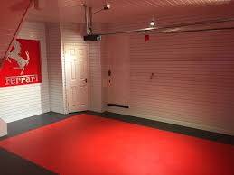 Red And Black Floor Tiles Were Used To Create This Striking Garage Floor Four Tiles Cover One Squar Diy Installation Wall Storage Cabinets Diy Garage Storage