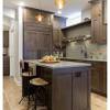 Oak worktops, black gloss cabinets and no wall units to make it feel more open. 1