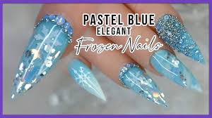 Follow survivor2018 for more pins like this nails matte. Pointed Almond Frozen Blue Acrylic Nails Blue Opal Bling Snowflakes Youtube