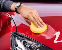 Image of Waxing a car