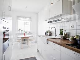 The grey tones in this kitchen go well with the white walls and dark granite countertops. My Scandinavian Home A Light And Airy White And Grey Swedish Apartment