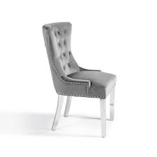 The arianna 1.8 m dining table has a smooth grey coloured marble top with a polished steel base, while the belvedere 'knockerback' dining chair has a pewter coloured crushed velvet effect upholstery and together these give an attractive contemporary dining look. Knightsbridge Grey Velvet Dining Chair With Lions Head Knocker Grosvenor Furniture