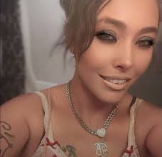 This woman, breaks relationship, even though she is in relationship with  her husband but don't live together. She lies and fake everything. She try  to break me and my partner up. She