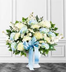 Blue and white flowers for funeral. Blue Sympathy Floor Basket Avas Flowers