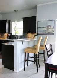 This one fits nicely at the back of this narrow kitchen and is the perfect spot for a glass of wine the compact kitchen here has plenty of storage along two walls, so the other wall has been utilized for a streamlined breakfast bar. 25 Breakfast Bar Ideas For Tiny Kitchens Comfydwelling Com