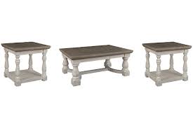 The sleek metal frames in aged bronze. Havalance Coffee Table With 2 End Tables Ashley Furniture Homestore