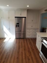 Enhanced vinyl plank flooring is similar to luxury vinyl plank flooring, otherwise known as lvp, which has been a favorite among our homeowners for years now, and which also offers better protections against spills over the more traditional hardwood flooring. Farmhouse Kitchen Coretec Pro Plus Monterey Oak Vinyl