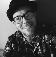 Origin of the game "light as a feather, stiff as a board"?