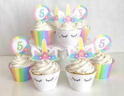 All you need is a touch of pink or white icing and then you can stick the horn on top. Printable Girl Unicorn Horn Cupcake Toppers And Wrappers Etsy In 2021 Rainbow Unicorn Birthday Rainbow Unicorn Birthday Party Unicorn Cupcakes Toppers