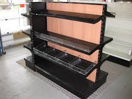 Black Gondola Shelving With Amberwood Pegboard From Our Showroom In Linden Nj Gondola Shelving Store Fixtures Shelving