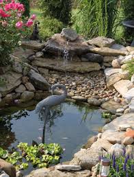 An outdoor turtle pond is the ultimate habitat for your turtle. Pond With Turtle Island Pond Design Ideas