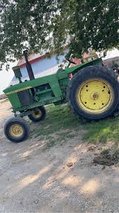 Image result for Yellow 1972 Tractor