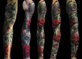 Sleeve tattoo japanese style on a hand men. Skull With Roses Tattoo On Full Sleeve