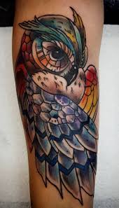 If you want a temporary owl tattoo design then your best option is to either have a watercolor owl tattoo or a pastel owl tattoo design like this. 50 Of The Most Beautiful Owl Tattoo Designs And Their Meaning For The Nocturnal Animal In You Kickass Things Owl Tattoo Owl Tattoo Design Tribal Owl Tattoos