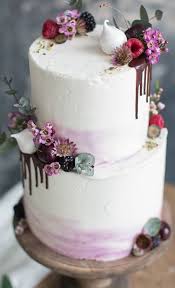 Final wedding cake, decorated with roses and monogram. The Prettiest Unique Wedding Cakes We Ve Ever Seen