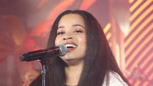 Ella Mai Partners With The Recording Academy For 'Boo'd Up' Evolving Music  Video