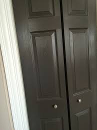 About kitchen cabinet uppers and lowers in different colours. Behr Intellectual In Semi Gloss Paint Primer Painted Interior Door In A Dark Gray Charcoal Closet Doors Painted Doors Interior French Doors Interior