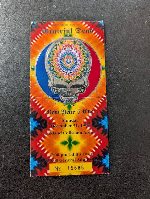 Grateful Dead New Year's Eve 1990 ticket with silver embossed stealie