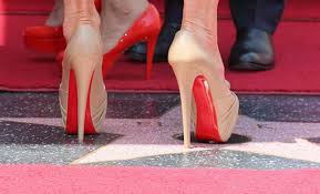 Red soles are exclusive to Christian Louboutin, YSL walks away with an all  red shoe - Luxurylaunches