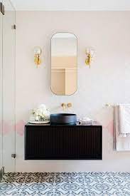 The mix of rich textures and organic details cook up a wall sconce with a sense of bohemian style to feast your eyes on. 6 Bohemian Bathroom Lighting Ideas To Get You Singing In The Shower Hunker Bathroom Lighting Bohemian Bathroom Bathroom Vanity Designs