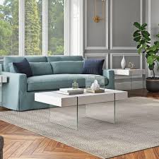 The mix of faux marble and tempered safety glass shelves provide a mature aesthetic to brighten your home. Architectoniq 5 Beautiful Coffee Tables For Living Room For A Classy Facelift Architectoniq