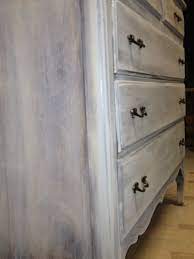 Two tone grey chest of drawers with red knobs. Flourish Vintage Grey Wash How To White Washed Furniture Furniture Gray Wash Furniture