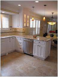 Your kitchen cabinets are a great place to refresh the look and decor of your kitchen. Kitchen Floor Tile Ideas With White Cabinets In 2021 Beige Kitchen Kitchen Flooring Modern Kitchen Flooring