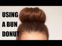 The donut's mesh material makes it easy to feel which parts have yet to be covered. How To Use A Bun Donut To Create An Updo Youtube
