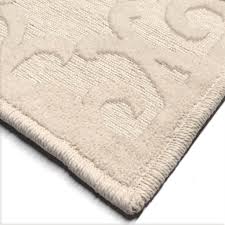 The rug is handknotted with wool which form the base or the background; Orian Rugs Boucle Seaborn On Sale Overstock 20753676