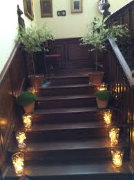 Use the second type if you wish to light up the terrace or backyard. Staircase With Salix Trees And Glass Vases Filled With Fairy Lights Fairy Lights Decorating Services Staircase