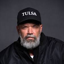 In less than a month, “Burning Flags,” a powerful exhibition by legendary  photographer Glen E. Friedman (@glenefriedman), opens at the Woody Guthrie  Center. Join us