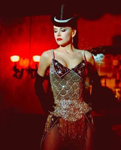 Moulin Rouge! (2001) Nicole Kidman's costumes as Satine are a masterclass  in theatrical glamour and storytelling. Designed by Catherine Martin  @catherinemartindesigns and Angus Strathie @anguslooking_2 , the wardrobe  draws heavily from cabaret,