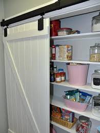 Design Ideas For Kitchen Pantry Doors A Sliding Barn Door Mounted On Rails Not Only Adds An Air Of Cott Kitchen Pantry Doors Kitchen Cabinet Doors Pantry Door