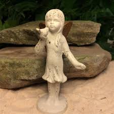 Free shipping on orders over $25 shipped by amazon. Cast Iron Standing Fairy With Bird Figurine Antique White Gold Zen Traditions