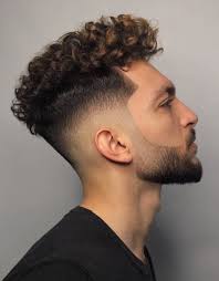 The volume does the talking where a little height is added. Curly Fade Hairstyles For Men 60 Stylish Haircuts To Try