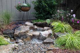 Create a stream that varies in width and depth before landing in the pond. Backyard Fountain Ideas How To Create A Waterfall Landscape