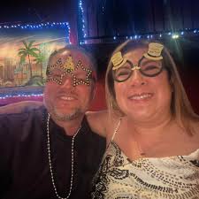 Back with their mama. Katie is cracking jokes, eating, and saying she feels  great.