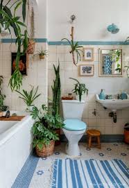 This minimal, rustic bathroom makes the best out of the least amount of decor possible, with a wooden ladder for the towels, a concrete floor, and open wood vanity. Low Budget Bathroom Decorating Ideas Apartment Decor Vintage Bathroom House Design