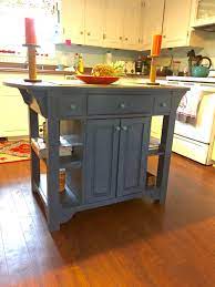 We Refinished A 25 Thrifted Kitchen Island With Rustoleum Chalked Paint In Coastal Blue It Flipping Furniture Diy Chalk Paint Furniture Distressed Furniture