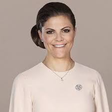 Crown Princess Victoria of Sweden is with Oskars Janaitis and Hasan Geleş.