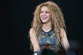 Blonde curly afro hair, portrait african woman , dark skin female face and sexy red lips. How To Bleach Curly Or Kinky Hair Without Damaging It Allure