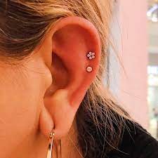 A Trend We Are Loving Lately Is Double Helix Piercings You Can Really Change Up Your Look Based On The Jewelry Double Helix Piercing Helix Piercing Piercings