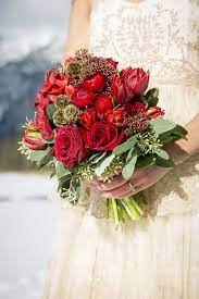 Looking for 144 roses for your artificial red rose. Red Bridal Bouquet With Roses Ranunculus Scabiosa Pods Tulips Trachelium And Seeded Euca Red Wedding Flowers Orchids Wedding Flowers Flower Bouquet Wedding
