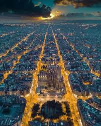 Add a unique experience to your visit in barcelona with a stop at the best nightclubs, bars, parties and nightlife experiences for 2 or 7 days by spending just €10 for an barcelona nightlife ticket. Aerial View Of Barcelona At Sunset La Sagrada Familia Can Be Seen Directly Below Picture Barcelona City Aerial View Barcelona Spain