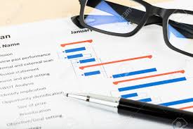 Project Management And Gantt Chart With Glasses And Pen