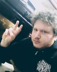 Here's me slav squatting next to my oven in a @verminwomb hoodie. It keeps  me very warm and cozy while I cook food that shouldn't be consumed. Listen  to their album Decline,