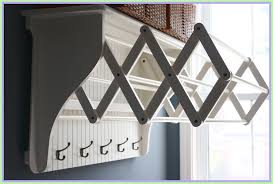 Sometimes it is a row of horizontal pegs, but sometimes it is more elaborate. Wall Mounted Hanging Rack Ideas On Foter