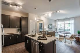 9230 grand ave, franklin park, il, 60131. Camden Franklin Park Apartments Franklin Tn Brown Interior Kitchen And Living Jpg Camdenliving Com
