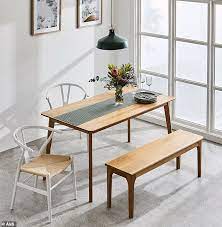 Pair of benches, the large rectangular solid oak seats raised up on trestle ends united by stretcher dimensions height 19.5 inches width 60.5 inches depth 10 inches. How To Furnish Your Entire House With 1 500 Daily Mail Online