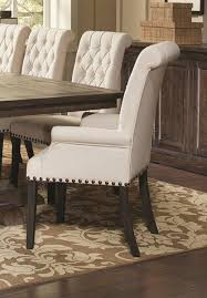 The seats and backs are padded and button tufted. Coaster Furniture Weber Dining Arm Chair Dining Chairs Upholstered Dining Chairs Dining Room Remodel